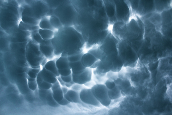 HDR / Colorized 3 image stack of mammatus clouds in Sioux County, IA on June 20, 2014